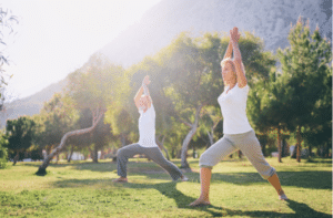 Senior family couple exercising outdoors.